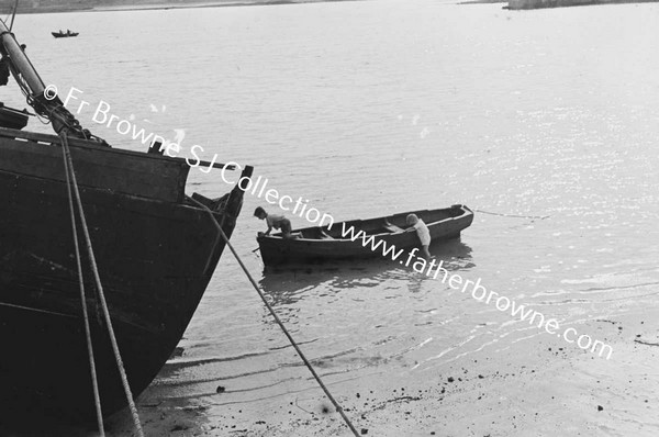 CHILD AT ROWING BOAT